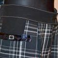 pusvilna, lielas rūtis, melnbaltas, dekoratības bantītes un lentītes, pogas, asimetriskas kabatas